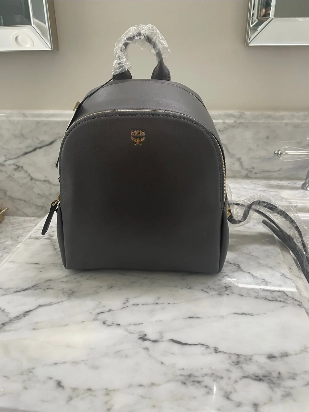 MCM Small Leather Backpack in Dark Gray with Gold Hardware